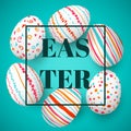 Happy Easter eggs frame with text. Colorful easter eggs on blue. Scandinavian ornaments Royalty Free Stock Photo