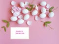 Happy Easter Eggs white  with roses petal on pink background Royalty Free Stock Photo