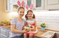 Happy easter! family mother and child daughter with ears hare ge Royalty Free Stock Photo