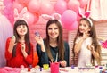 Happy easter family paint eggs. Easter, mother and children in pink bunny ears. Royalty Free Stock Photo