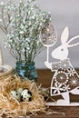 Happy Easter! Festive composition with Easter eggs on wooden background.