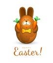 Happy Easter greeting card. Easter egg in the form of a cute chocolate bunny. The figurine of a brown rabbit is decorated with