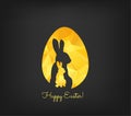 Happy Easter greeting card in low poly triangle style. Flat design polygon of golden easter egg and bunny on black backgr
