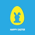 Happy Easter greeting card in Ukrainian colors. Easter egg shape with bunny ears silhouette.