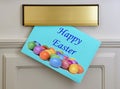 Happy Easter Greetings Card - Eggs on blue background Royalty Free Stock Photo