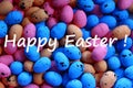 Happy easter greetings with many colourful eastereggs