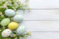 Happy easter handwritten sentiment Eggs Orange blossoms Basket. White Basket Bunny Meadow blossom. orange slice background Royalty Free Stock Photo