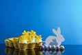Happy Easter holiday background concept. Easter decoration with flowers in egg shells, bunny and sweet eggs. Creative