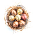 Easter nest with golden eggs Royalty Free Stock Photo