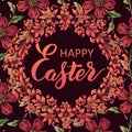 Happy Easter lettering on a floral background. Beautiful floral backdrop with handwritten calligraphy. Royalty Free Stock Photo