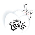 Happy Easter lettering. White bunny, three Easter eggs and hand inscription on white background.