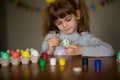 Happy easter. Little girl painter painted eggs. Kid preparing for Easter. Painted hand. Finger paint. Art and craft concept Royalty Free Stock Photo