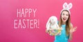 Happy Easter message with woman with Easter basket