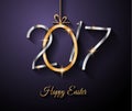 Happy 2017 Easter modern and elegant background with a Golden egg and metal effect lettering