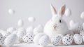 Happy Easter! Monochromatic white banner with easter bunny rabbir on white background, surrounded by white eggs