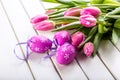 Happy easter. Multicolored spring tulips and Easter eggs. Spring and Easter decorations