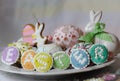 happy easter pastel eastereggs bunny cookies table lace words alphabet greeting message Royalty Free Stock Photo