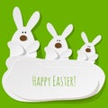 Happy Easter Postcard three Bunnies on a green background. Royalty Free Stock Photo