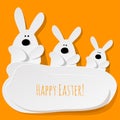 Happy Easter Postcard three Bunnies on a yellow background. Royalty Free Stock Photo