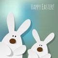 Happy Easter Postcard two Bunnies on a blue bokeh fog background. Royalty Free Stock Photo