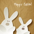Happy Easter Postcard two Bunnies on a crumpled paper brown background. Royalty Free Stock Photo