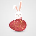 Happy Easter. Easter Rabbit bunny with realistic big egg with spots isolated on gray background. Cute, funny cartoon Royalty Free Stock Photo