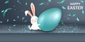 Happy Easter. Easter Rabbit Bunny with realistic blue egg on gray background. Cute, funny cartoon rabbit character with Royalty Free Stock Photo