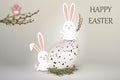 Happy Easter. Easter Rabbit Bunny with realistic egg on gray gackground. Cute, funny cartoon rabbits character with Royalty Free Stock Photo