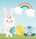 Happy easter rabbit with egg chicken rainbow field flowers