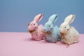 Happy Easter with rabbit figure on pink and blue background