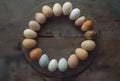 Happy Easter. Rustic Egg Circle on Wooden Tray Royalty Free Stock Photo