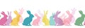 Happy Easter Seamless Background With Colorful Easter Bunny Silhouette Isolated On A White Background. Horizontally Repeatable