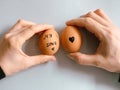 Happy Easter or st valentines morning before breakfast. Young couple holding eggs with declaration of love. Art on eggs