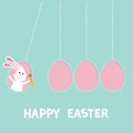 Happy Easter text. Hanging pink painting egg set. Bunny rabbit hare holding carrot. Dash line. Perpetual motion mobile. Greeting c Royalty Free Stock Photo