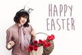 Happy Easter text. season`s greetings card. Beautiful happy girl Royalty Free Stock Photo