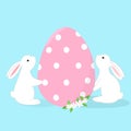 Happy Easter vector illustration, two cute white bunny rabbits holding giant egg painted with sweet pastel pink polka dots Royalty Free Stock Photo