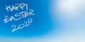 Happy Easter 2020 written in the blue sky Royalty Free Stock Photo