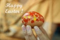 Happy Easter. Young girl painting Easter eggs in hand. April spring season and Easter holiday creative activity. Happy Easter Day Royalty Free Stock Photo