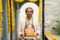 Happy Elder man with Ganesha Idol coming home during ganesha or vinayaka Chaturthi festival - Concept of indian