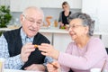 Happy elderly couple eating dinner Royalty Free Stock Photo