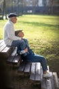 Happy elderly couple enjoying spring in park Royalty Free Stock Photo