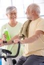 Happy elderly couple in the gym Royalty Free Stock Photo