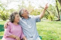 Happy elderly couple with lifestyle after retiree concept. Lovely asian seniors couple embracing together in the park. Royalty Free Stock Photo