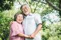 Happy elderly couple with lifestyle after retiree concept. Lovely asian seniors couple embracing together in the park. Royalty Free Stock Photo