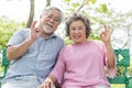 Happy elderly couple with lifestyle after retiree concept. Lovely asian seniors couple embracing together in the park. Royalty Free Stock Photo