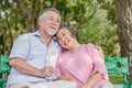 Happy elderly couple with lifestyle after retiree concept. Lovely asian seniors couple embracing together in the park. Royalty Free Stock Photo