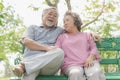 Happy elderly couple with lifestyle after retiree concept. Lovely asian seniors couple embracing together in the park. Royalty Free Stock Photo