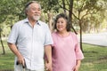 Happy elderly couple with lifestyle after retiree concept. Lovely asian seniors couple embracing together in the park. Royalty Free Stock Photo