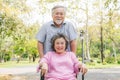 Happy elderly couple with lifestyle after retiree concept. Lovely asian seniors couple embracing together in the park. Royalty Free Stock Photo