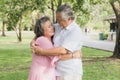 Happy elderly couple with lifestyle after retiree concept. Lovely asian seniors couple embracing together in the park. Royalty Free Stock Photo